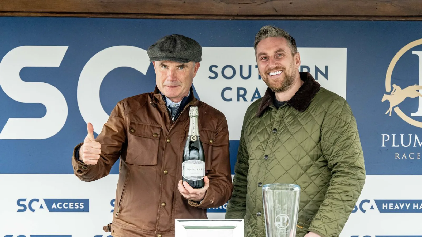 Stephen Welch collecting an award at Plumpton Racecourse