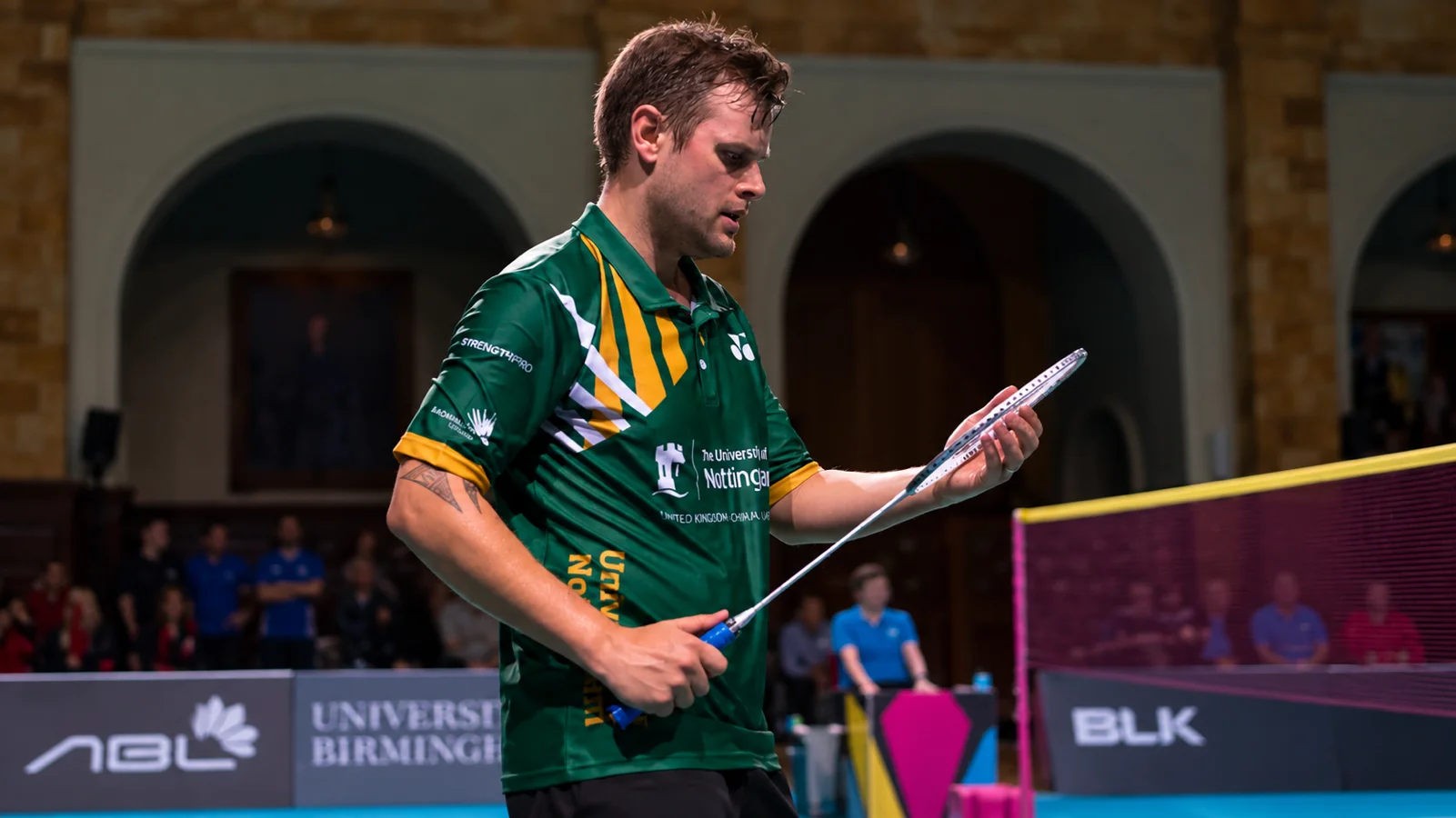 Matthew Hughes celebrating a Welsh National Badminton Championship title