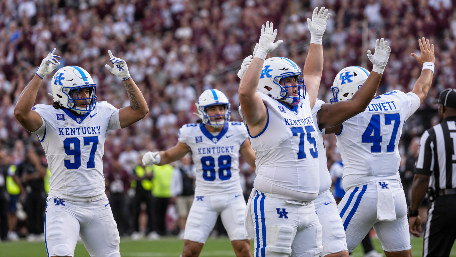 Kentucky players celebrate during their upset victory over Texas A&M.
